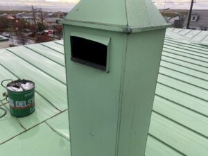 グラインダーで間口を広げた集合煙突